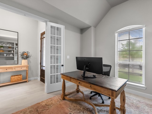 706 Westwood Dr, League City, TX 77573 - home office featuring vaulted ceiling, french doors, and wood finished floors