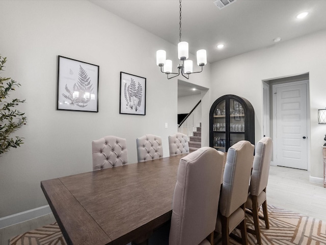 706 Westwood Dr, League City, TX 77573 - dining area featuring a chandelier, stairs, and recessed lighting