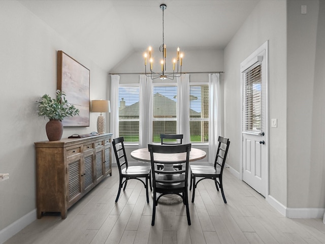 706 Westwood Dr, League City, TX 77573 - dining space featuring a chandelier, light wood-style flooring, and vaulted ceiling
