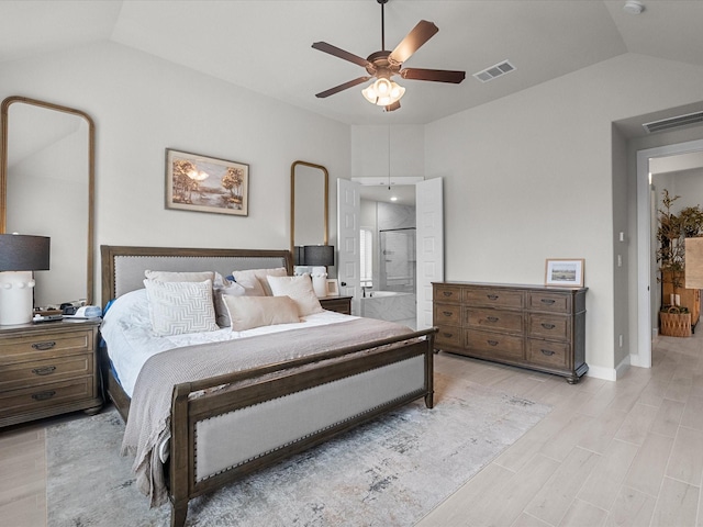 706 Westwood Dr, League City, TX 77573 - bedroom featuring lofted ceiling, light wood-style floors, a ceiling fan, and connected bathroom