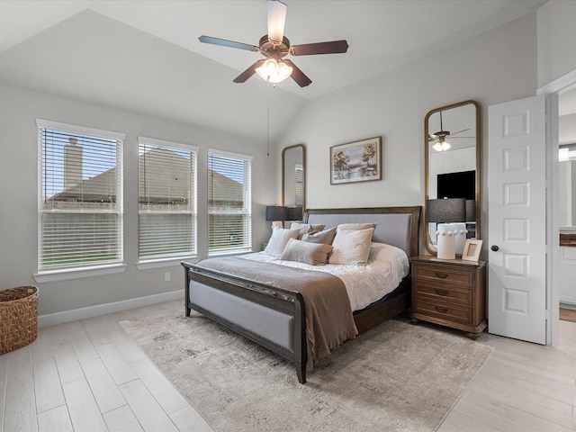 706 Westwood Dr, League City, TX 77573 - bedroom featuring vaulted ceiling, light wood-style flooring, and ceiling fan
