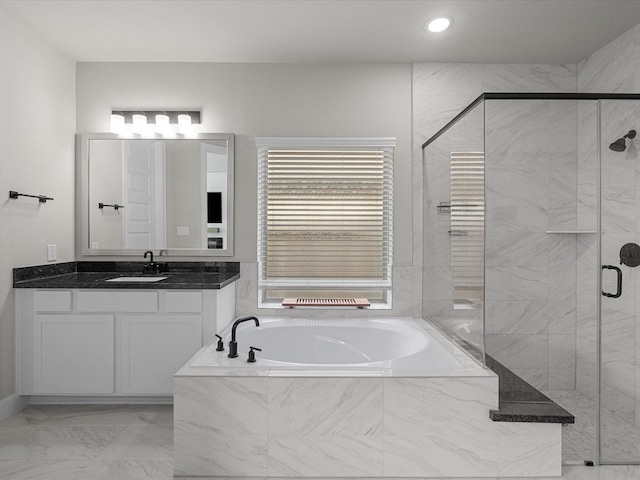 706 Westwood Dr, League City, TX 77573 - bathroom featuring a garden tub, vanity, a stall shower, marble finish flooring, and recessed lighting