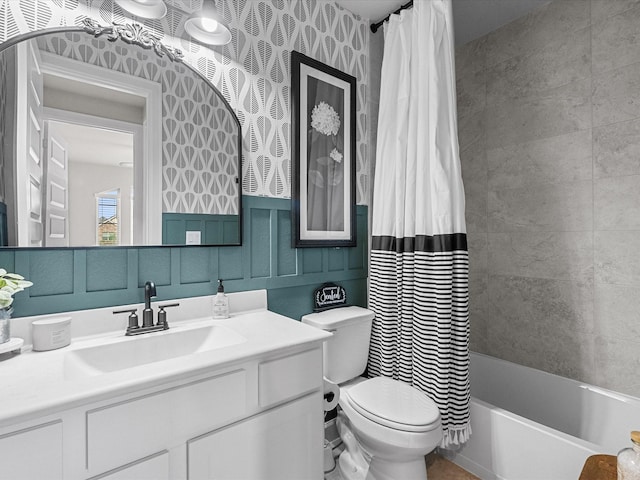 706 Westwood Dr, League City, TX 77573 - bathroom featuring vanity, shower / bathtub combination with curtain, and wallpapered walls