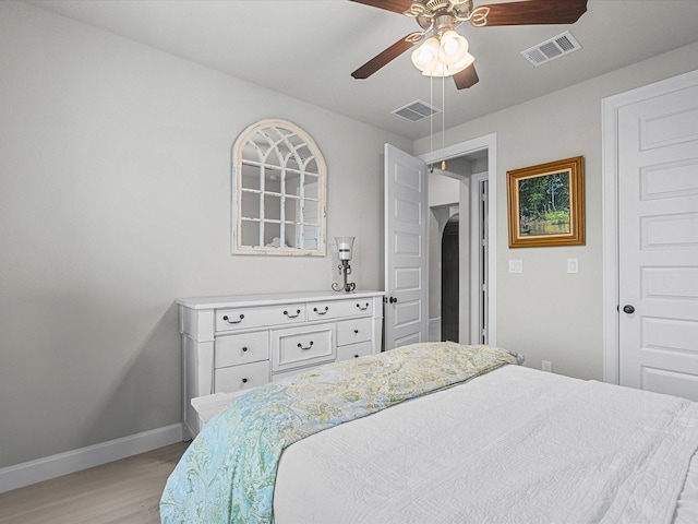 706 Westwood Dr, League City, TX 77573 - bedroom featuring light wood finished floors and ceiling fan