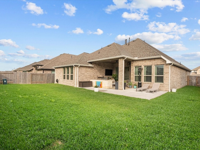 706 Westwood Dr, League City, TX 77573 - rear view of house with a patio, a fenced backyard, brick siding, and a shingled roof