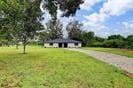 3889 County Road 155, Alvin, TX 77511 - view of green lawn