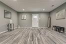 3889 County Road 155, Alvin, TX 77511 - basement with wood finished floors and recessed lighting