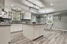3889 County Road 155, Alvin, TX 77511 - kitchen featuring dark countertops