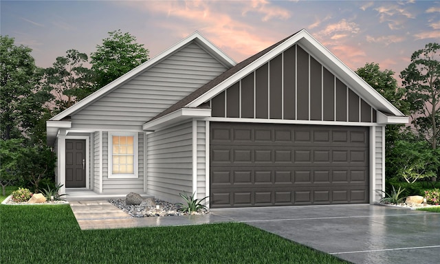 13317 Burbot Dr, Conroe, TX 77384 - view of front of property featuring board and batten siding, a garage, and driveway