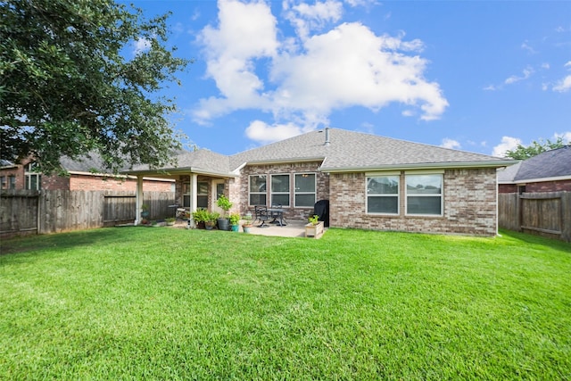 28407 Kinglet Pines Dr, Katy, TX 77494 - rear view of property featuring a patio, a fenced backyard, brick siding, and roof with shingles