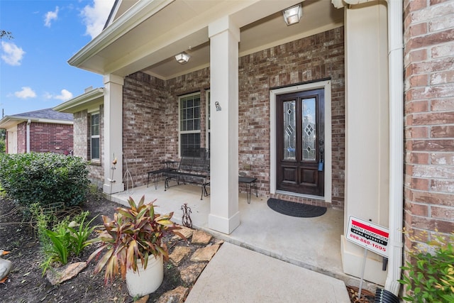 28407 Kinglet Pines Dr, Katy, TX 77494 - property entrance with brick siding and a porch