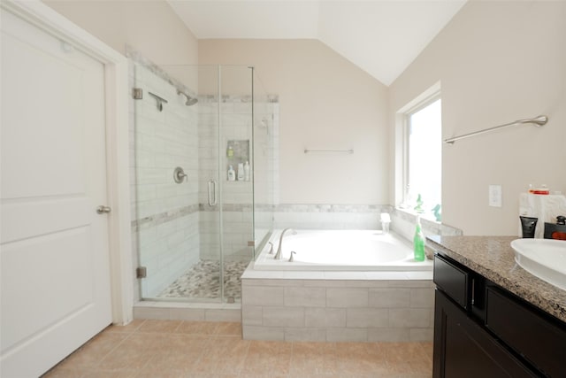 28407 Kinglet Pines Dr, Katy, TX 77494 - full bathroom with vanity, a stall shower, a bath, tile patterned floors, and lofted ceiling