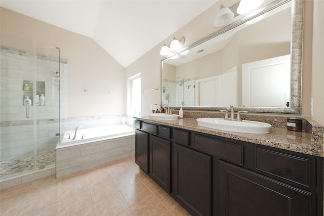 28407 Kinglet Pines Dr, Katy, TX 77494 - bathroom with double vanity, a stall shower, a bath, vaulted ceiling, and tile patterned flooring