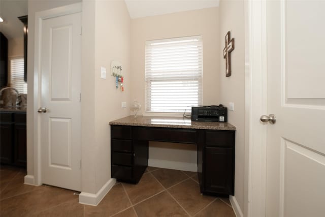 28407 Kinglet Pines Dr, Katy, TX 77494 - home office featuring light tile patterned floors and built in desk