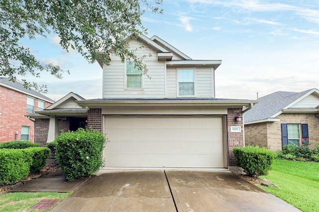 1927 Vermillion View St, Fresno, TX 77545 - traditional-style house featuring a garage, brick siding, and concrete driveway