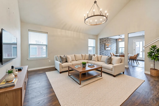 1927 Vermillion View St, Fresno, TX 77545 - living area with healthy amount of natural light, a chandelier, dark wood-type flooring, and high vaulted ceiling