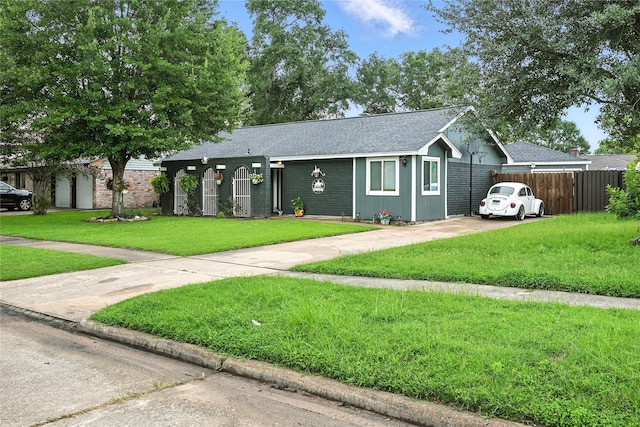 319 Shady Glade Dr, Houston, TX 77090 - ranch-style house featuring driveway and roof with shingles