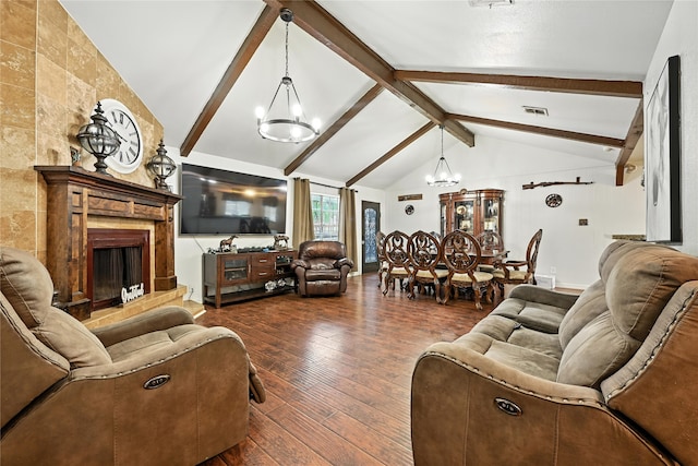 319 Shady Glade Dr, Houston, TX 77090 - living room featuring a chandelier, dark wood-style floors, and a fireplace with raised hearth