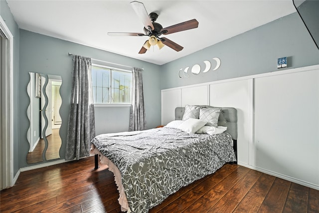 319 Shady Glade Dr, Houston, TX 77090 - bedroom featuring dark wood-type flooring and ceiling fan