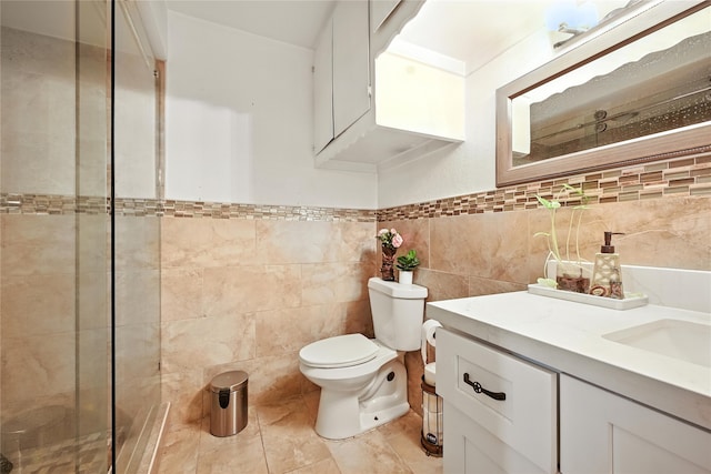 319 Shady Glade Dr, Houston, TX 77090 - full bathroom with vanity, a stall shower, tile walls, and tile patterned floors
