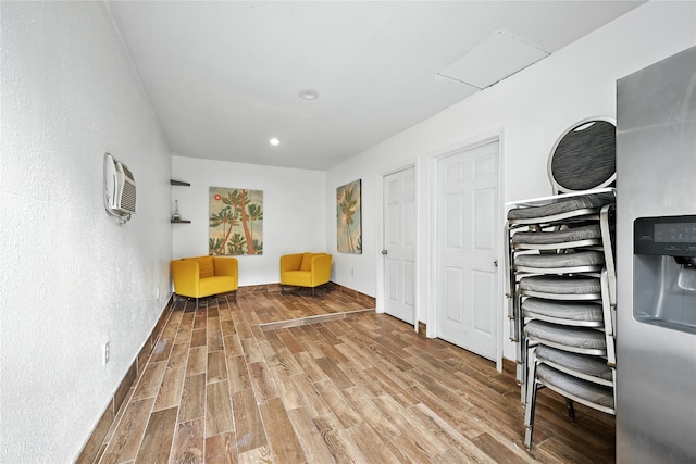 319 Shady Glade Dr, Houston, TX 77090 - living area featuring wood finished floors and recessed lighting