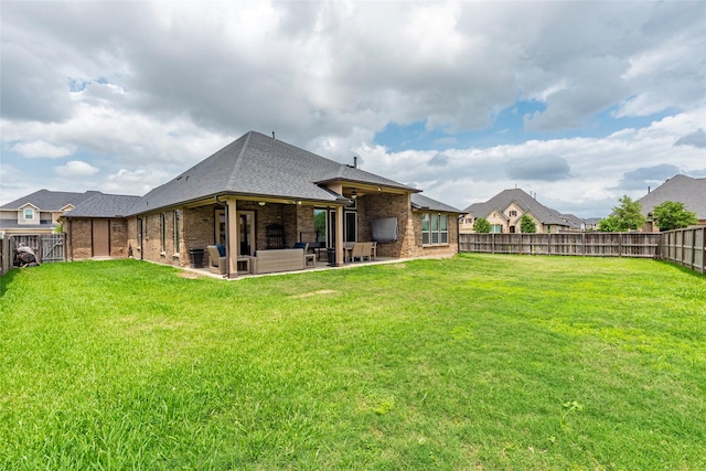 1806 Bridge Gate Ln, Katy, TX 77494 - fenced backyard featuring a patio and outdoor lounge area