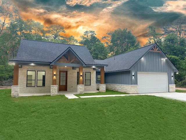 51 V Allen Ln, Coldspring, TX 77331 - modern farmhouse style home with stone siding, a shingled roof, board and batten siding, and a front lawn