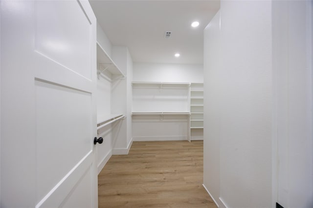 51 V Allen Ln, Coldspring, TX 77331 - spacious closet featuring wood finished floors