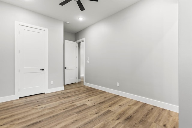 210 Hogan Ln, Hempstead, TX 77445 - unfurnished bedroom with light wood finished floors, ceiling fan, and recessed lighting