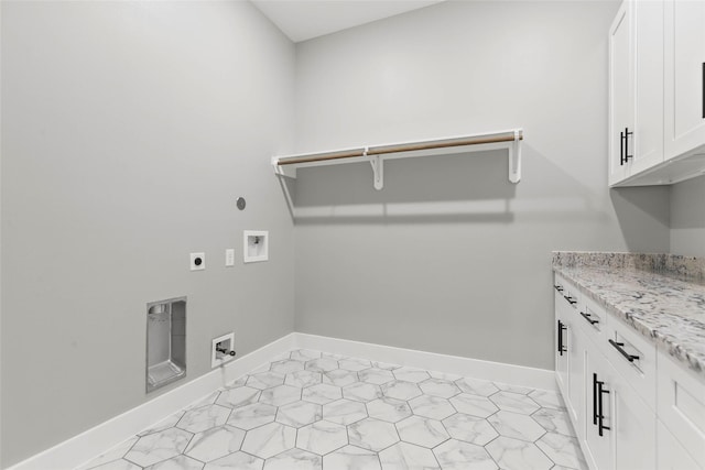 210 Hogan Ln, Hempstead, TX 77445 - laundry room with electric dryer hookup, hookup for a washing machine, and cabinet space