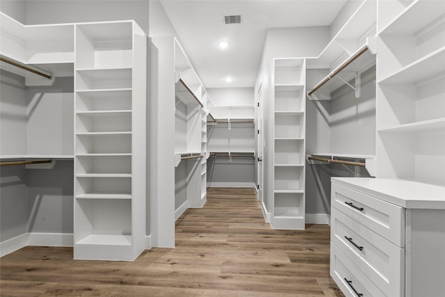 210 Hogan Ln, Hempstead, TX 77445 - walk in closet featuring wood finished floors