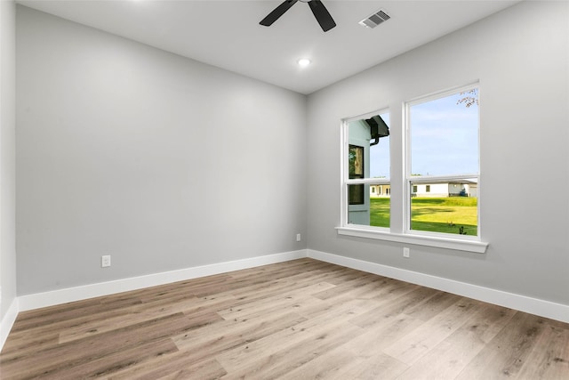 210 Hogan Ln, Hempstead, TX 77445 - unfurnished room with wood finished floors, ceiling fan, and recessed lighting