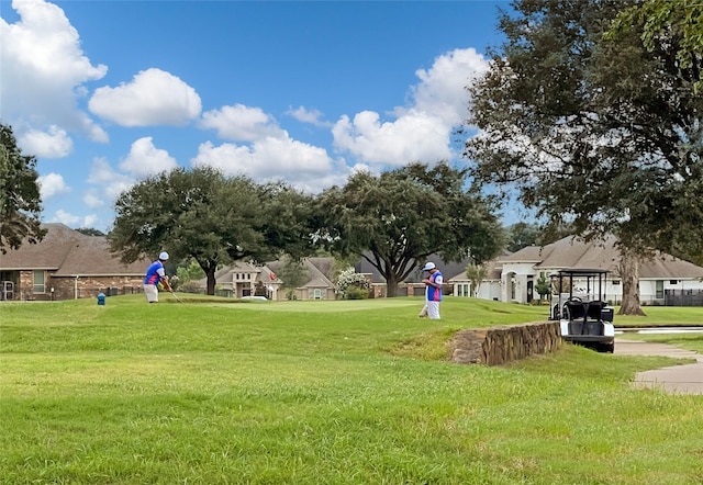 210 Hogan Ln, Hempstead, TX 77445 - surrounding community with a residential view and a yard