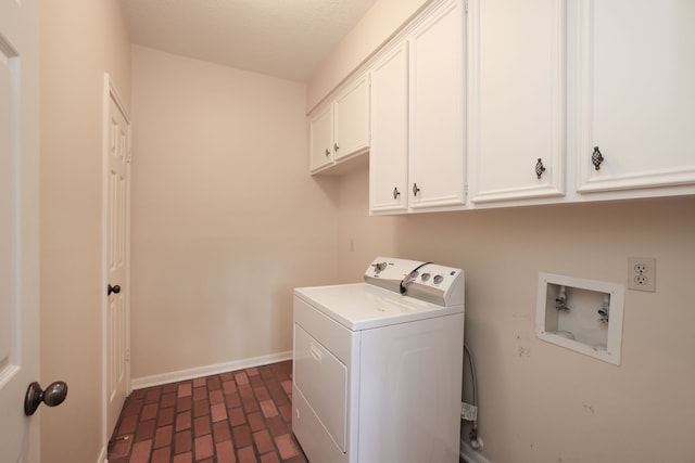 9327 Tranquil Park Dr, Spring, TX 77379 - washroom with cabinet space and brick flooring