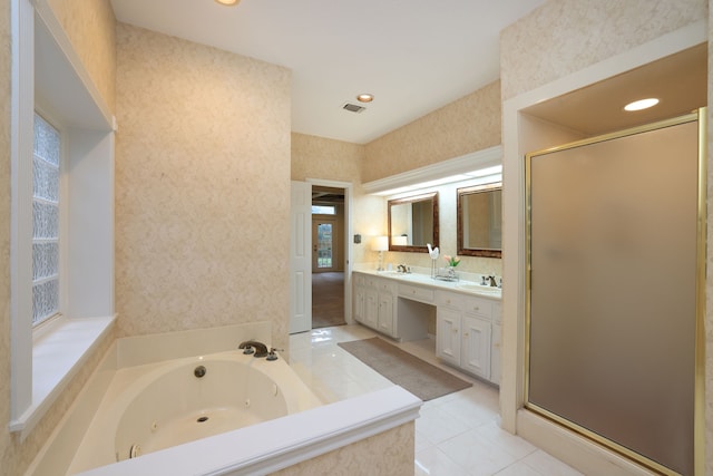 9327 Tranquil Park Dr, Spring, TX 77379 - full bathroom with double vanity, a shower stall, a whirlpool tub, tile patterned floors, and wallpapered walls