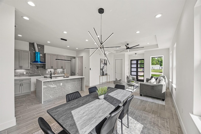 316 E Oakdale St, Dayton, TX 77535 - dining room with wood finish floors, recessed lighting, and a ceiling fan
