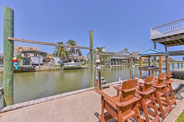 34 Tarpon Ln, Freeport, TX 77541 - dock featuring boat lift and a water view