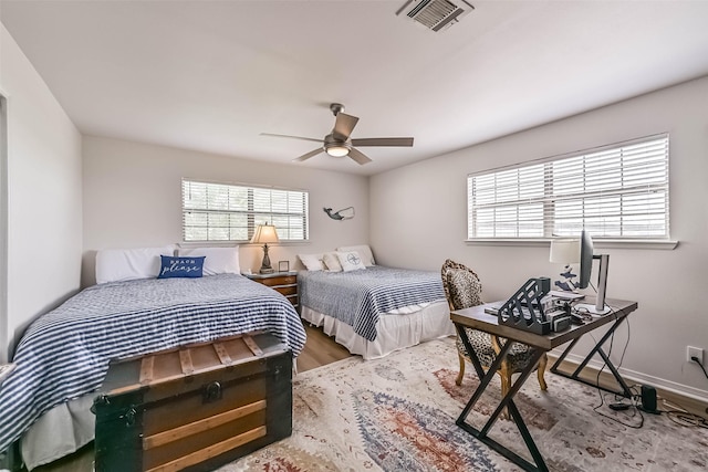 34 Tarpon Ln, Freeport, TX 77541 - bedroom featuring wood finished floors and ceiling fan