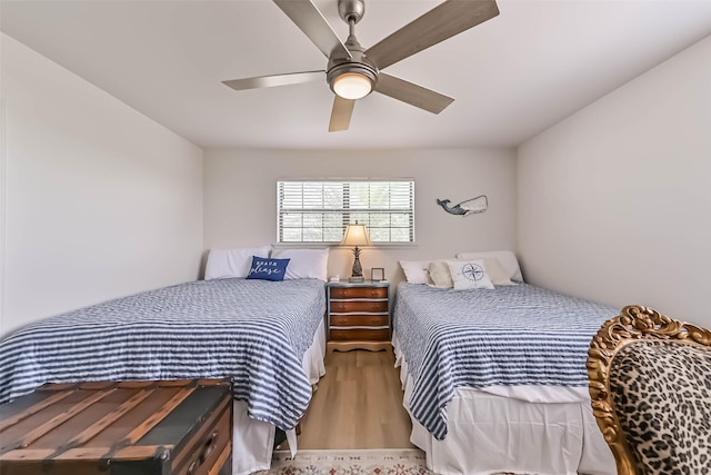 34 Tarpon Ln, Freeport, TX 77541 - bedroom featuring wood finished floors and ceiling fan