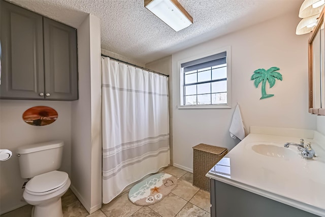 34 Tarpon Ln, Freeport, TX 77541 - bathroom with a textured ceiling, vanity, tile patterned floors, and a shower with curtain
