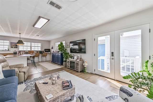 34 Tarpon Ln, Freeport, TX 77541 - living room featuring light wood finished floors