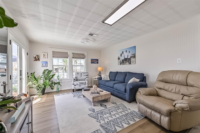 34 Tarpon Ln, Freeport, TX 77541 - living room featuring light wood finished floors