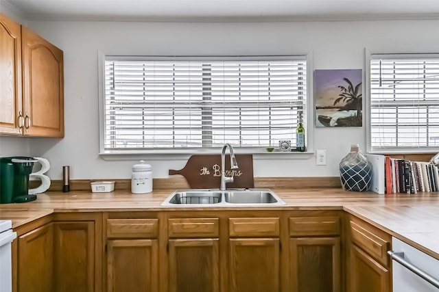 34 Tarpon Ln, Freeport, TX 77541 - kitchen with light countertops and white dishwasher