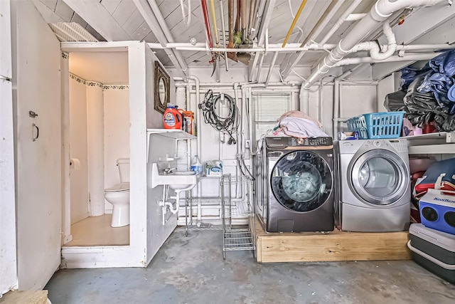34 Tarpon Ln, Freeport, TX 77541 - garage with separate washer and dryer