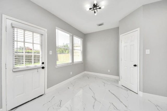 7427 Oakwood Canyon Dr, Cypress, TX 77433 - foyer featuring baseboards and marble look tiles