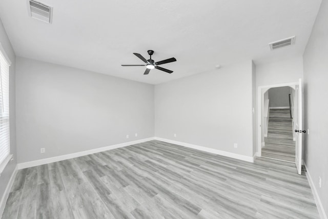 7427 Oakwood Canyon Dr, Cypress, TX 77433 - empty room with ceiling fan and light wood finished floors