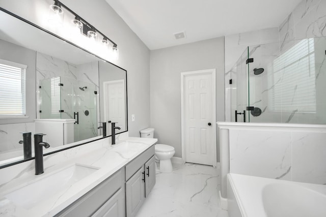 7427 Oakwood Canyon Dr, Cypress, TX 77433 - full bathroom featuring marble look tile flooring, double vanity, a marble finish shower, and a garden tub