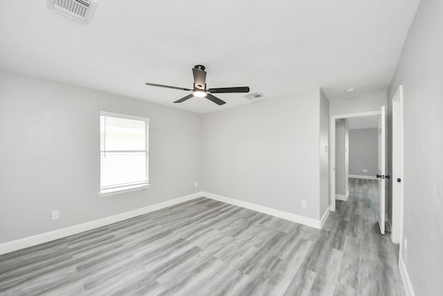 7427 Oakwood Canyon Dr, Cypress, TX 77433 - unfurnished room featuring ceiling fan and light wood finished floors