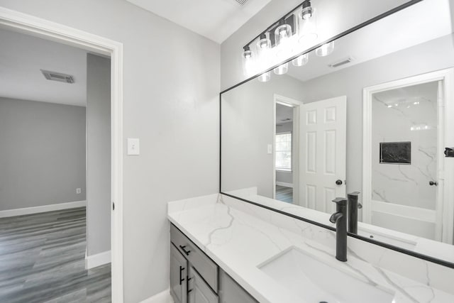 7427 Oakwood Canyon Dr, Cypress, TX 77433 - bathroom with vanity and wood finished floors