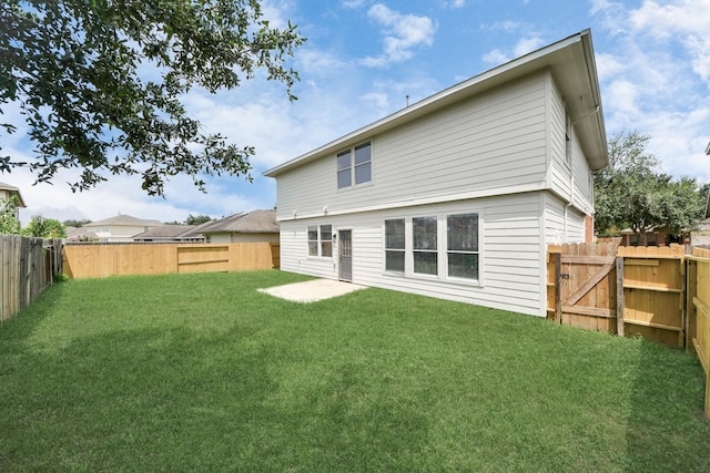 7427 Oakwood Canyon Dr, Cypress, TX 77433 - rear view of house with a fenced backyard